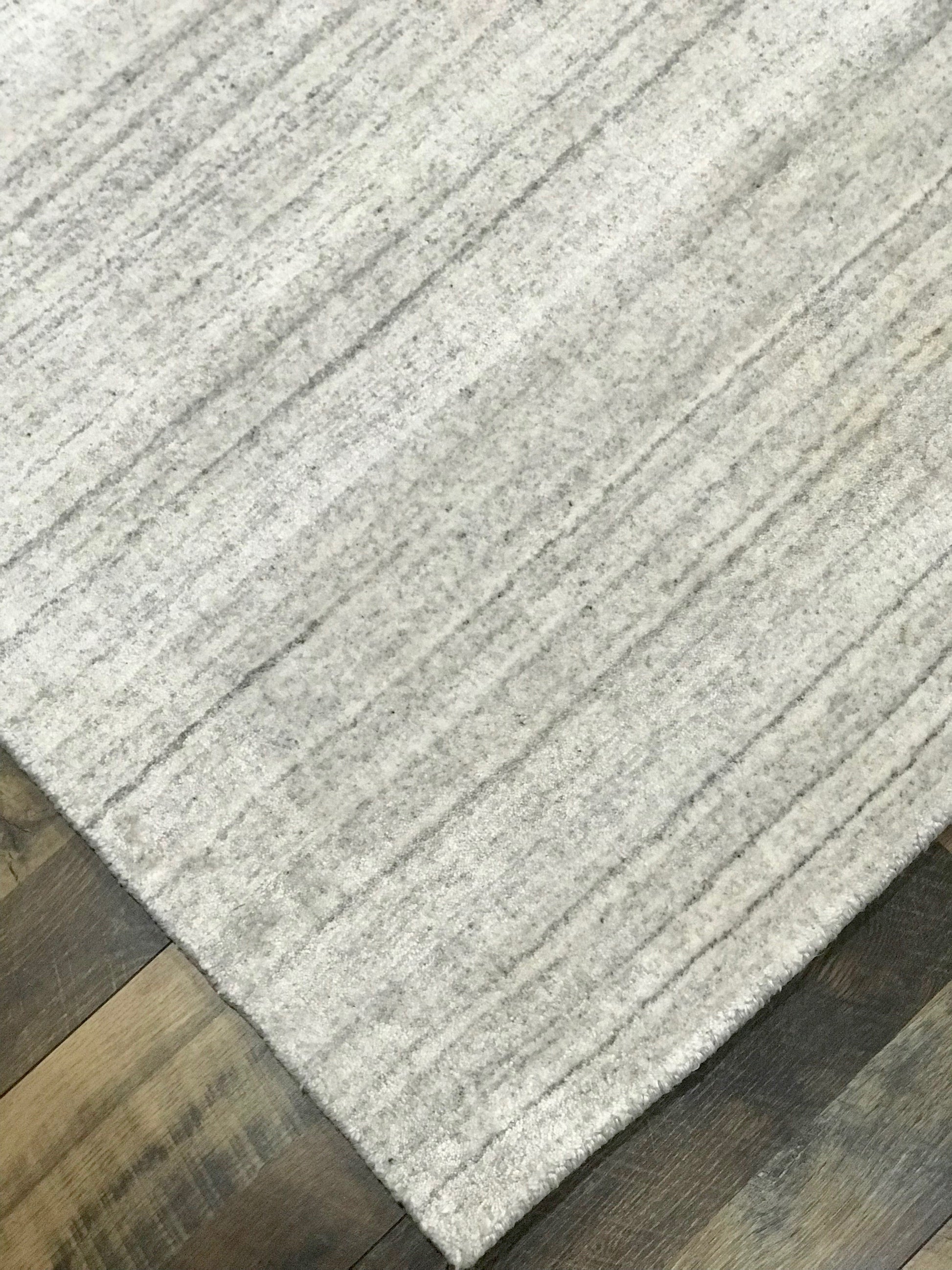refined area rugs basix collection solid colored wool viscose ivory area rug online affordable handmade hand knotted rug store orange county