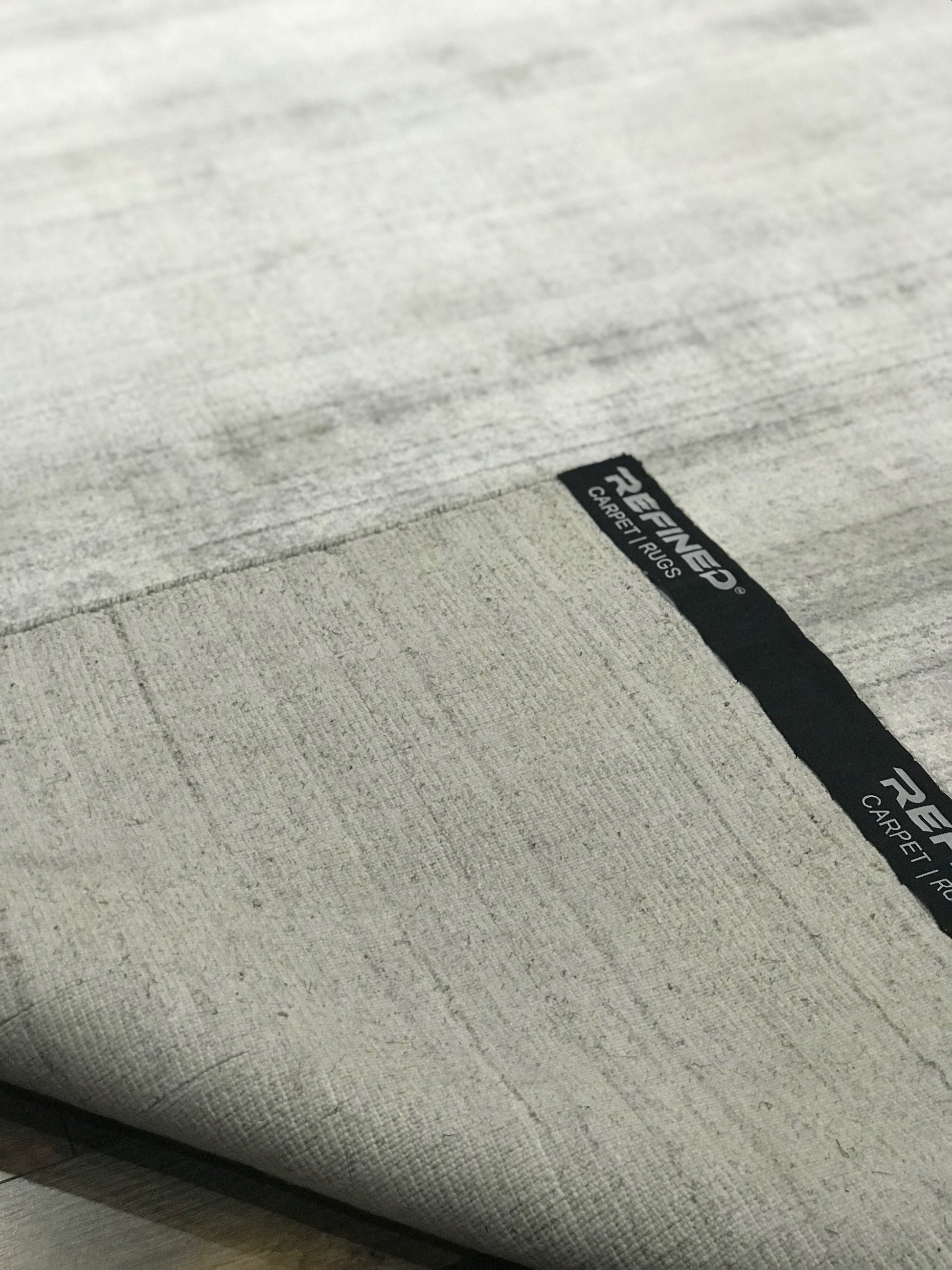 refined area rugs basix collection solid colored wool viscose ivory area rug online affordable handmade hand knotted rug store orange county