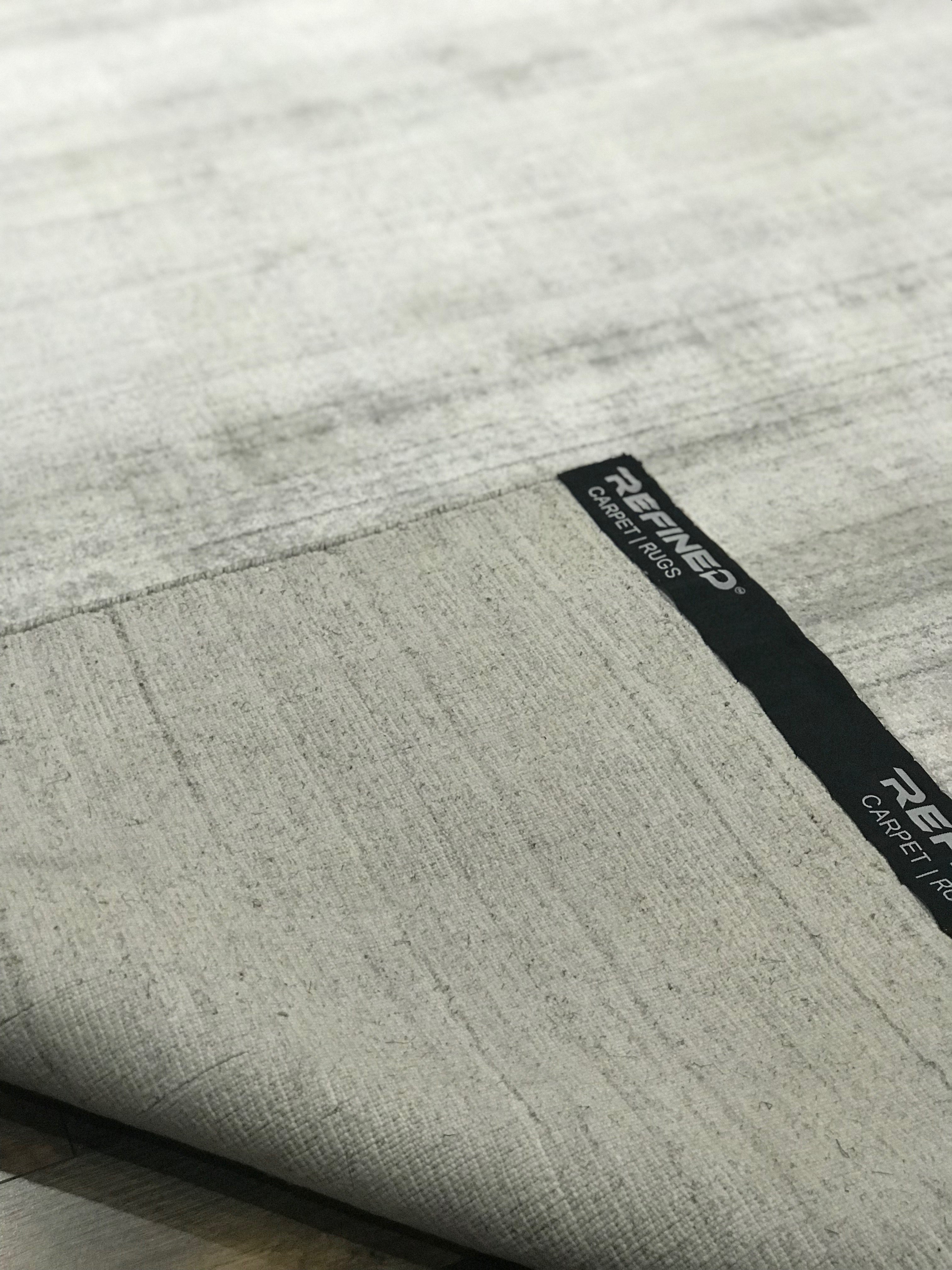 refined area rugs basix collection solid colored wool viscose ivory area rug online affordable handmade hand knotted rug store orange county